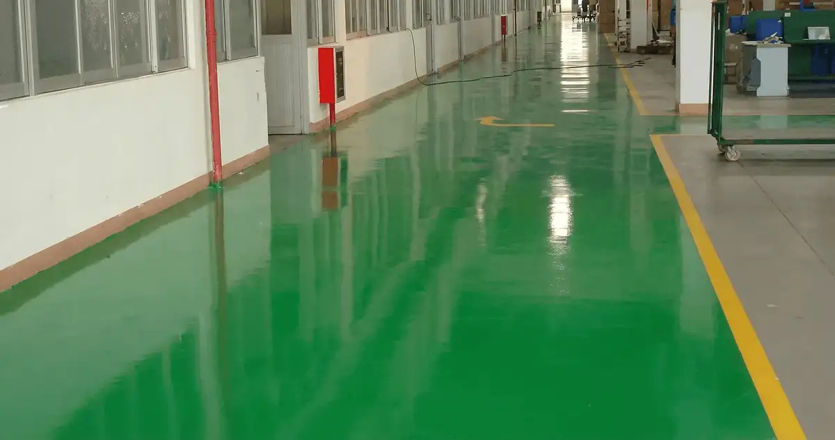 A factory floor professionally covered and marked with epoxy flooring in Lowell, MA
