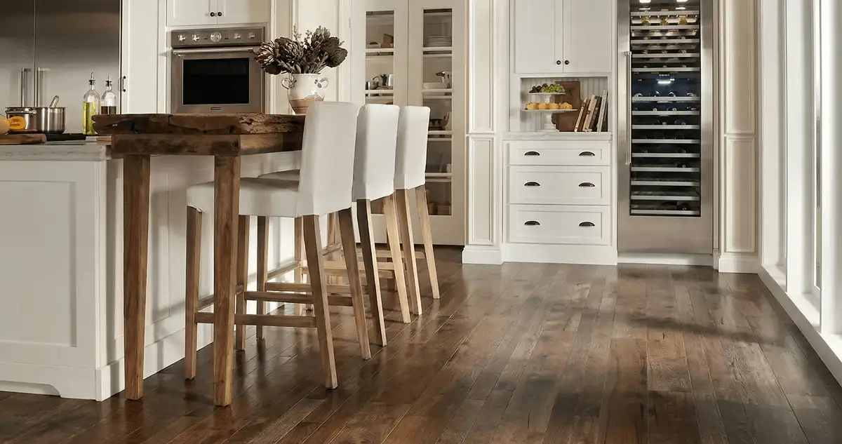 Professionally installed and refinished hardwood flooring in a residential home, showcasing smooth finish and natural wood tones in Lowell, MA