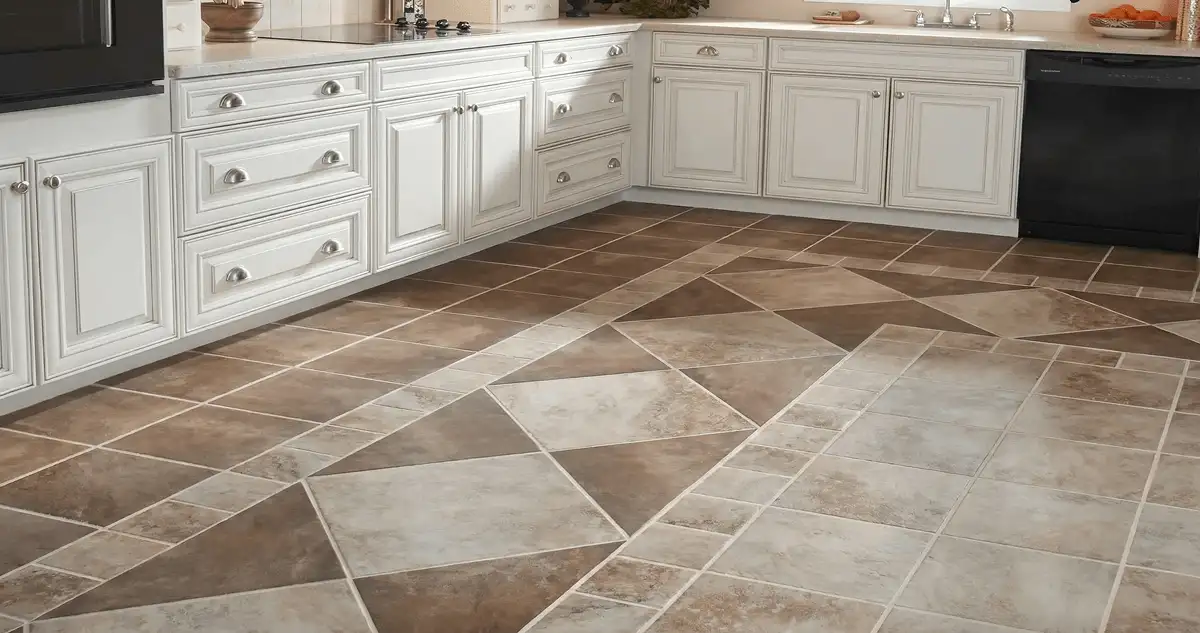 Kitchen with white cabinets and a professionally installed tile floor in Lowell, MA