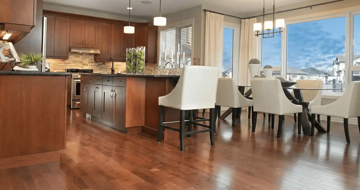 A modern kitchen with professionally installed wood flooring in Lowell, MA